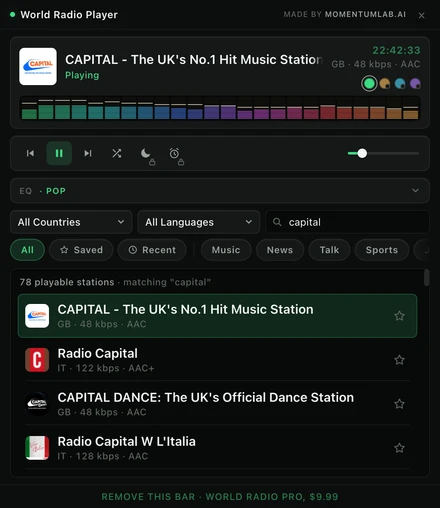 The deck playing a station with the LED spectrum wall lit across all twenty four columns in the green rainbow palette, white peak hold dots above them.